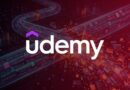 Udemy logo over a neon red and purple futuristic digital network background