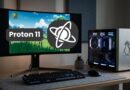 Desktop PC setup with monitor showing a game scene and Proton 11 logo overlay, plus a gaming tower with a penguin decal on the right.