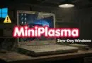 Old, cracked laptop on a wooden desk in a dark workshop, with a bold 'MiniPlasma' title and 'Zero-Day Windows' subtitle; warning icon nearby.