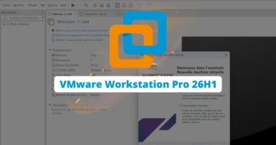 VMware Workstation Pro 26H1 splash screen with blue-orange stacked logo over a VM window surface.1