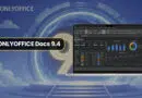 Laptop displaying OnlyOffice Docs 9.4 analytics dashboard on a blue sci‑fi backdrop.