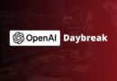OpenAI Daybreak branding over a dark, code-filled developer workstation with monitors and keyboards.