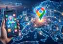 Hand holding a smartphone showing map icons as glowing routes over a world map with a bright location pin in the center.
