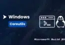Promotional banner for Windows Coreutils at Microsoft Build 2026, showing the Windows Coreutils logo, a terminal window icon, and the Linux penguin.