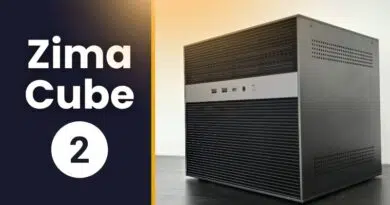 ZimaCube 2 Review: An All-in-One NAS for Your Personal Cloud Zima Cube 2 desktop computer shown on a desk with a dark left panel and a yellow divider, highlighting the product name.