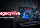 LegacyHive Zero-Day Windows promo: red logo on the left with a dark, high-tech setup showing a desktop PC displaying a critical security breach alert on the screen.