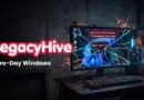 LegacyHive Zero-Day Windows promo: red logo on the left with a dark, high-tech setup showing a desktop PC displaying a critical security breach alert on the screen.