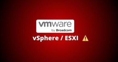 VMware by Broadcom logo with vSphere/ESXi text and a yellow warning triangle on a red gradient background